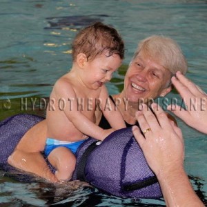 Image of child being treated in hydrotherapy pool